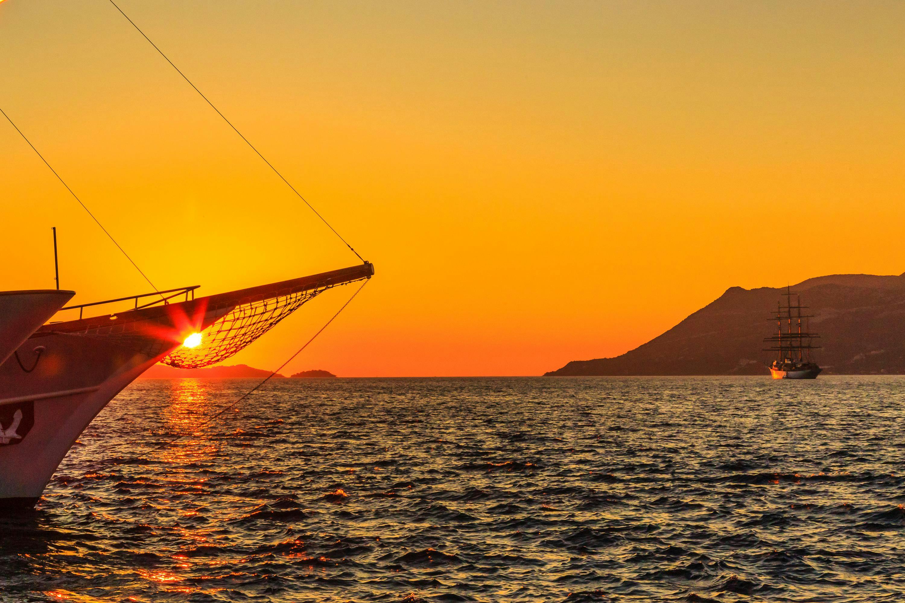 A sunset view from the ship Sea Cloud on the Dalmatian Coast, Adriatic Sea, Mediterranean, Croatia.